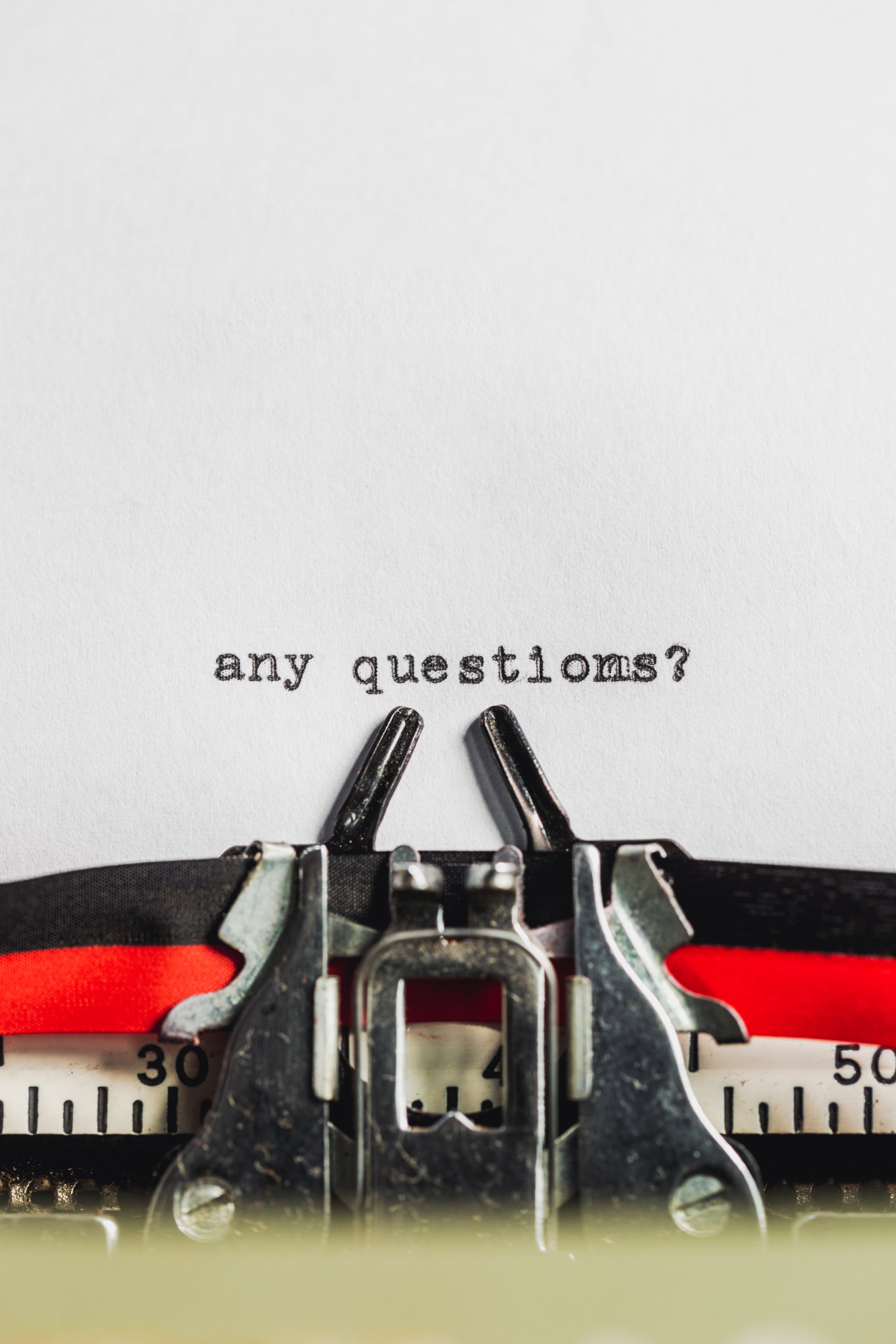 text-on-typewriter-asks-any-questions.jpg